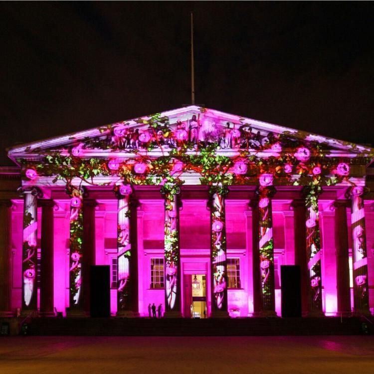 Decorative lighting on the front of the British Museum at night