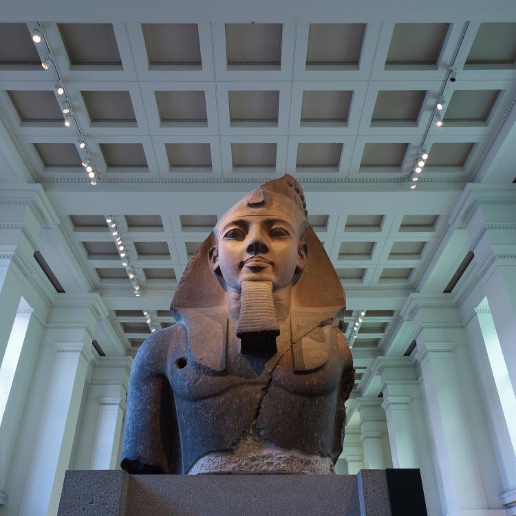 Bust of Pharaoh in the Egyptian sculpture gallery, lit up. 