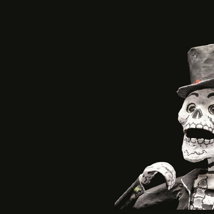 Skeleton wearing top hat and jacket