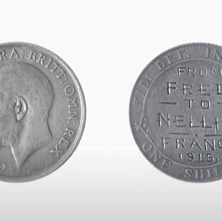 Two sides of coin, one inscribed with 'From Fred to Nellie France 1916'