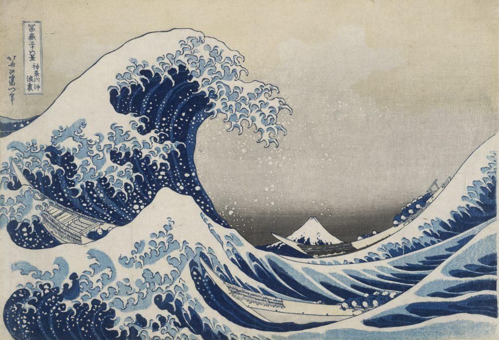 Colour woodblock print of a crashing wave with mountain behind