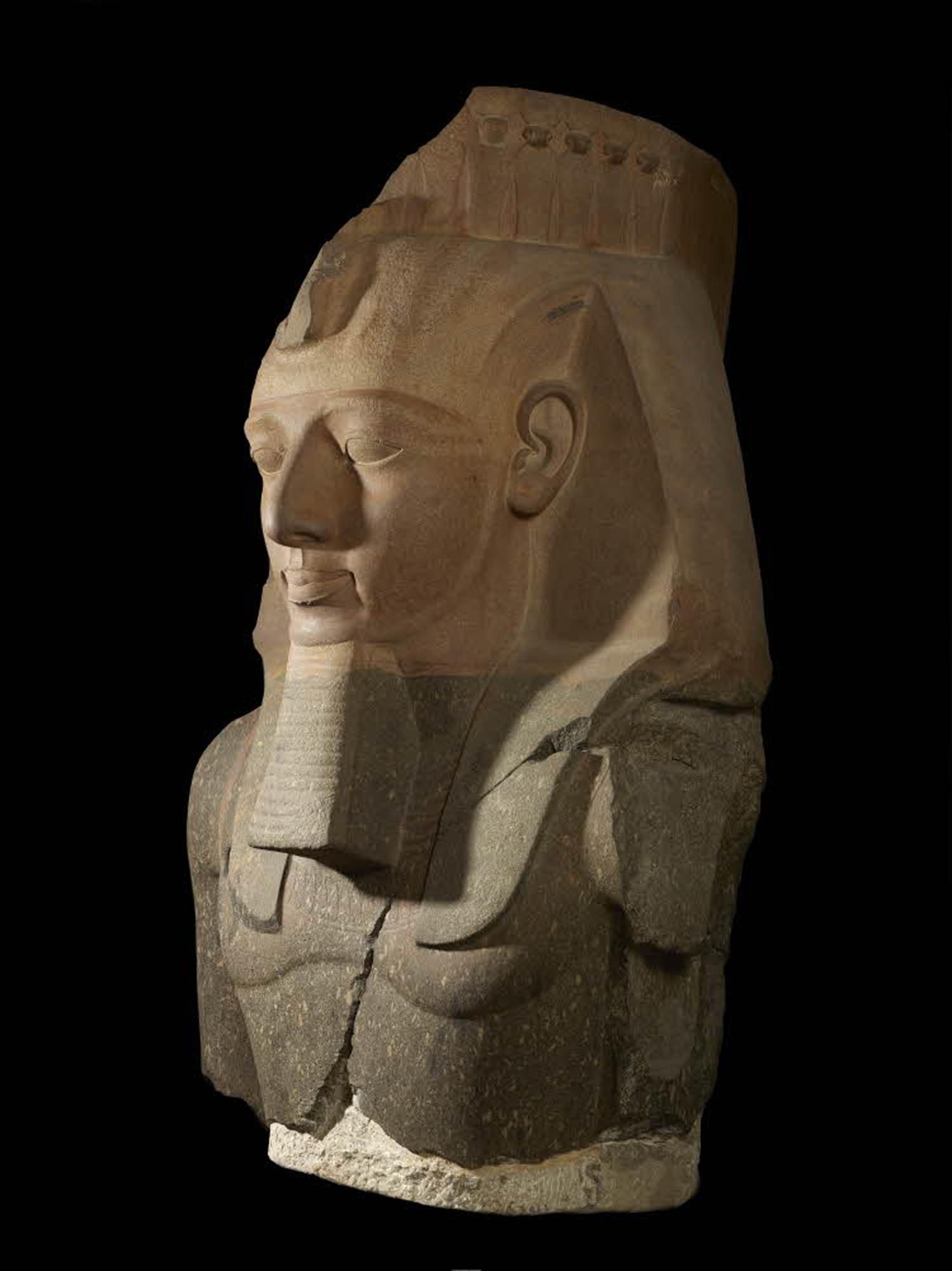 Large stone bust, from chest up, of Pharaoh.