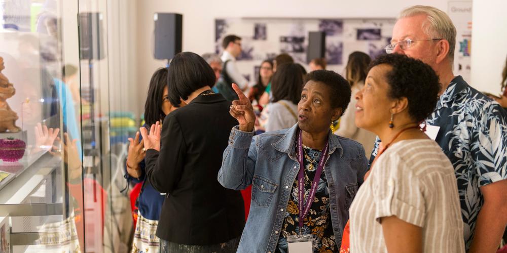 Members of the Family Object Journeys group hosting an evening event for the public at the British Museum