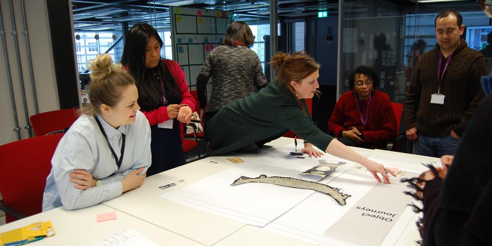 Members of the Family Object Journeys group exploring the British Museum collection and producing a new display case