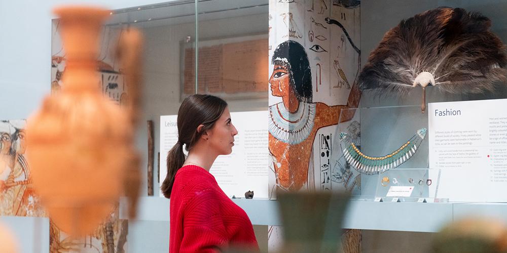 Visitor looking at displays in Room 61