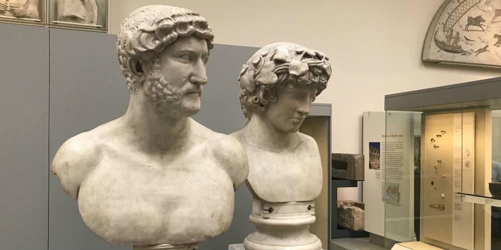 Marble busts of Hadrian and Antinous in the Roman Empire gallery