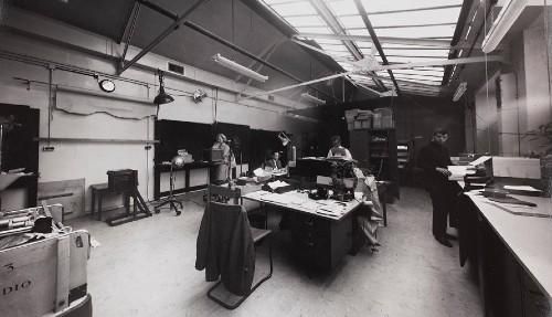 Black and white photograph showing the Top studio – a large daylight photographic studio with a glass roof. 