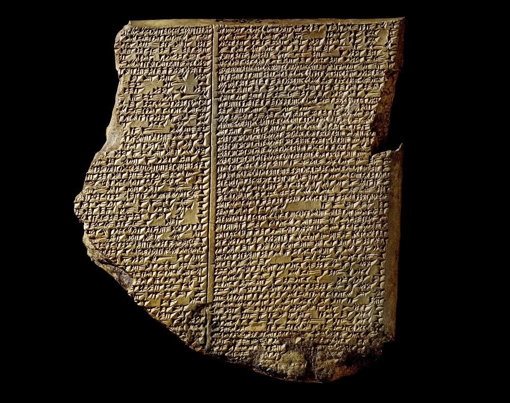 A rectangular clay tablet covered with cuneiform script written in two columns