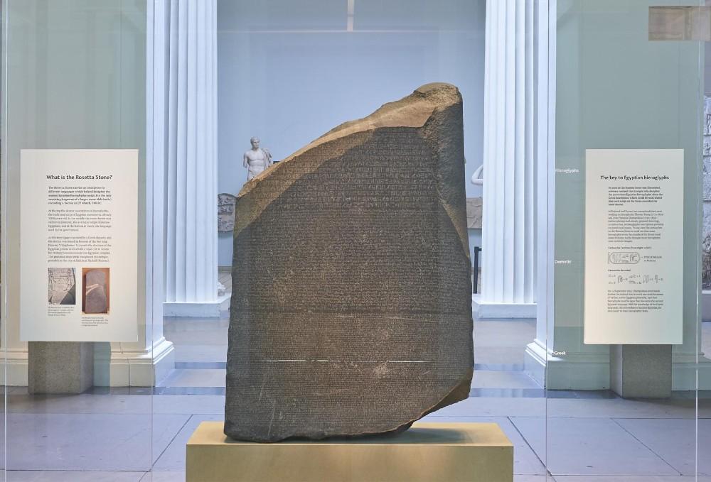 Rosetta Stone in Room 4 framed by a doorway behind