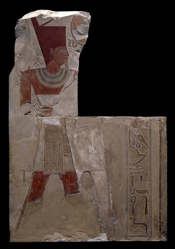 Fragment of limestone showing Mentuhotep II, wearing the red crown of Lower Egypt