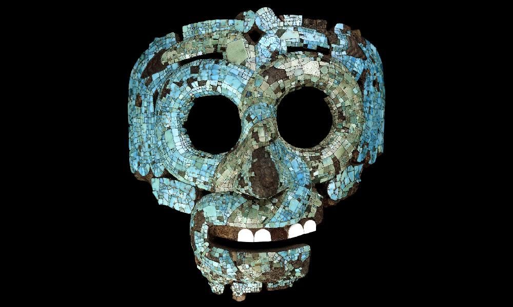 Mask in the form of two intertwined and looped serpents worked in contrasting colours of turquoise mosaic