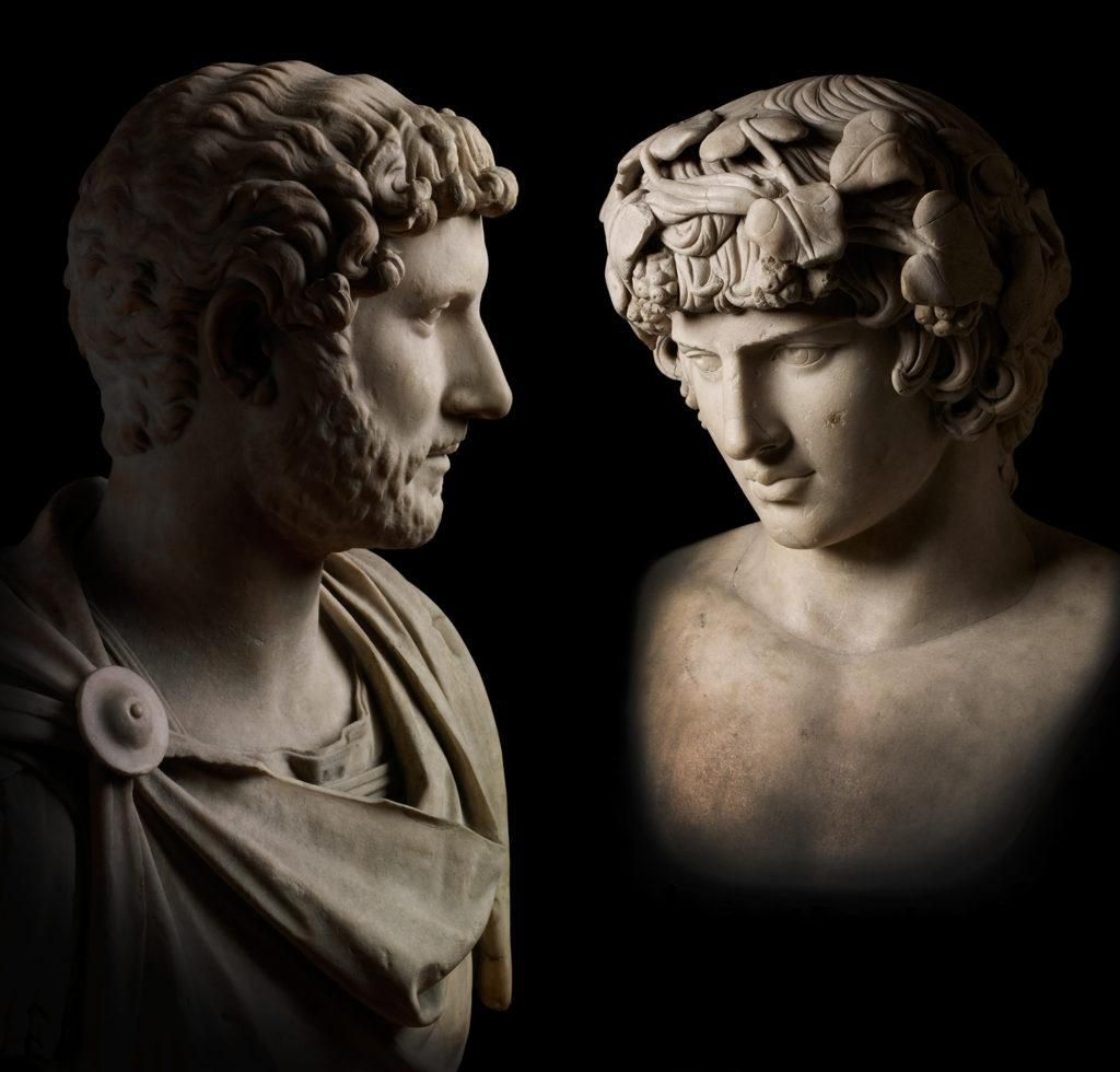 Bust of Hadrian wearing military dress and a marble portrait head of Antinous wearing a wreath of ivy